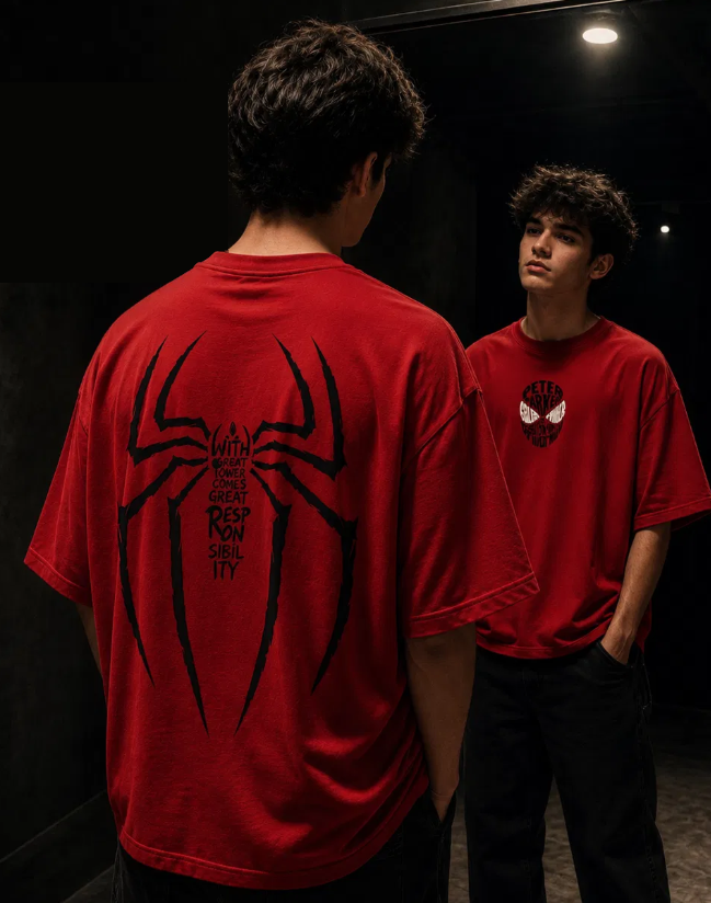 Model wearing the Fave Wear red Spiderman graphic tee in a dark mirror room